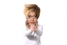 a woman with glasses says yehey love it with a heart