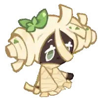 a mummy cookie with a green bow on her head .