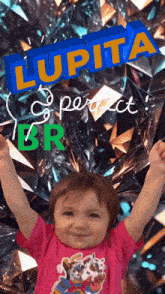 a little girl wearing a pink shirt with the name lupita above her