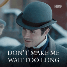 a man wearing a bowler hat with the words " don 't make me wait too long " below him