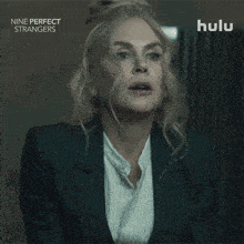 a woman with a surprised look on her face is on a hulu ad