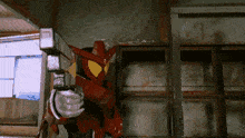 a red robot with yellow eyes is holding a hammer