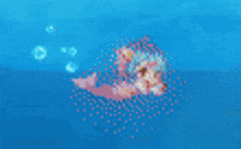 a blurred image of a mermaid in the ocean