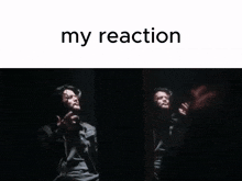 a man singing into a microphone with the words " my reaction " behind him