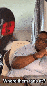 a woman is sitting in front of a chair that says 3dxime on it