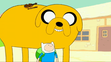 a cartoon character is standing next to a large yellow dog