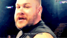 a close up of a man 's face with the words social media on the bottom right