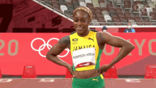 waving elaine thompson herah team jamaica nbc olympics smile