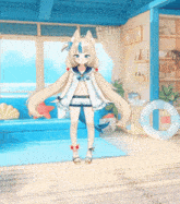 a girl with long blonde hair is standing in a living room