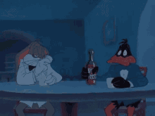 bugs bunny and goofy are sitting at a table with a drink and a bottle of tequila .