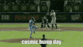 a baseball player is swinging a bat at a pitch while another player watches .