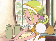 a girl with green hair is standing in front of a window looking at a vase