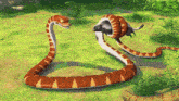 a cartoon snake is eating another snake in a grassy field