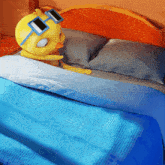 a cartoon chicken wearing sunglasses is standing on a bed