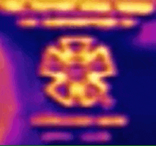 a close up of a blurred image of a flower on a blue background .