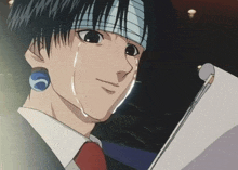 a man with a bandage on his head is crying