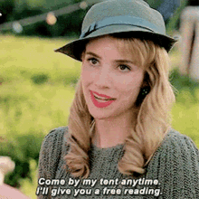 a woman wearing a hat says come by my tent anytime and i 'll give you a free reading