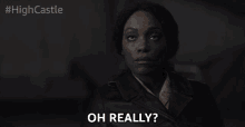 a woman in a leather jacket says oh really in a dark room