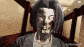 a gif of a man with blood on his face and the website gifrun.com
