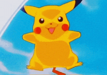 a pikachu cartoon character is standing on a blue surface .