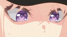 a close up of a person 's eyes with purple circles