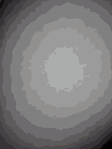a white pillow with a light shining on it