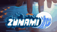 a person pressing a button with the word zunami on it