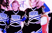 a group of cheerleaders for the ravens are dancing together