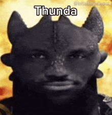 a man with horns on his head is wearing a toothless costume from how to train your dragon .