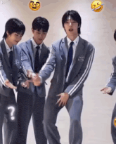 a group of young men in suits and ties are standing next to each other and dancing .