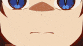 a close up of a person 's face with blue eyes and an angry look on their face .