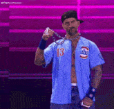 a man wearing a blue cubs jersey with the number 13 on it