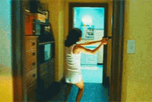 a pixelated image of a woman holding a gun