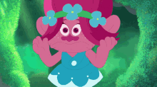 a troll with a flower crown on her head