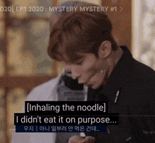 a video of a man eating noodles with a caption that says " inhaling the noodle "
