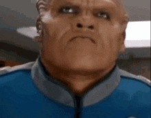 a close up of a man 's face with his mouth open in a video game .