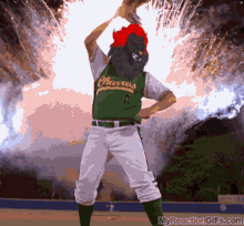 a baseball player for the charros stands in front of a fireworks display