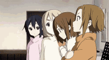 a group of anime girls standing next to each other in a room