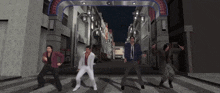 a group of men are dancing on a city street
