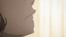 a close up of a person 's mouth with a yellow curtain behind them