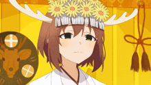 a girl with flowers on her head and antlers