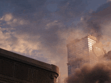 smoke coming out of a building with the letter x on the top
