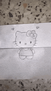 a black and white drawing of hello kitty with hearts around her head