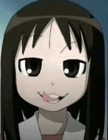 a close up of a girl making a funny face with her tongue out