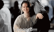a man is carrying a woman on his shoulders and says `` i pooped !!! '' .