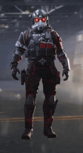 a soldier in a gas mask has a red patch on his arm that says ' emergency ' on it