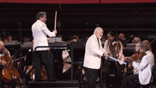 John Williams Gustavo Dudamel GIF - John Williams Gustavo Dudamel Lightsaber GIFs