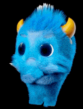 a blue stuffed animal with horns on its head