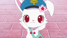a white rabbit with red eyes wearing a blue hat