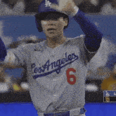 a baseball player wearing a los angeles jersey